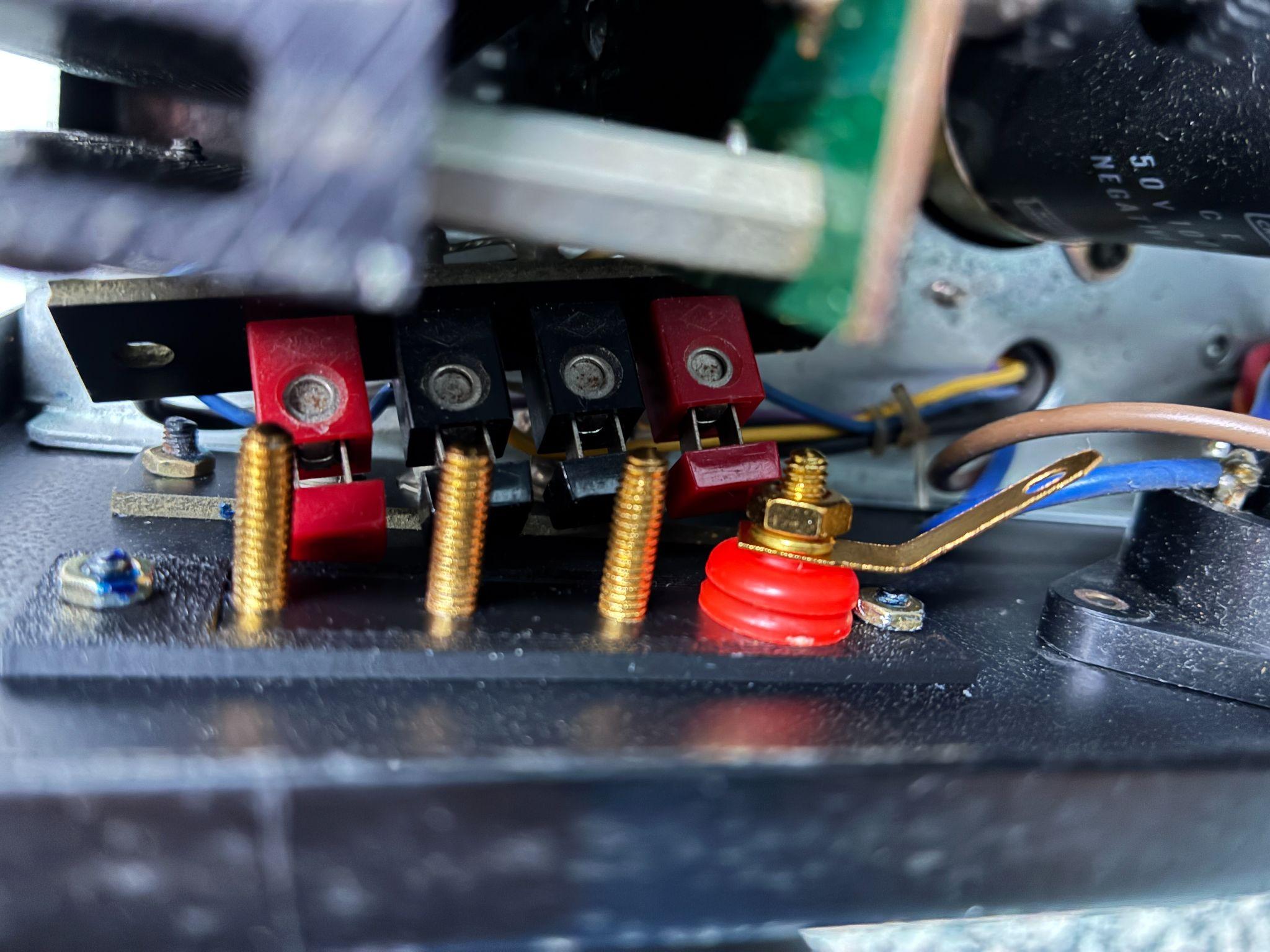Wires secured, insulating sleeves in place